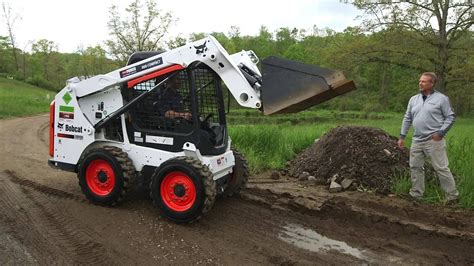 how to run a bobcat skid steer|driving a skid steer loader.